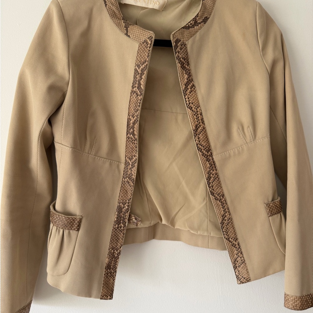 Valentino beige fitted blazer with snake detailing.